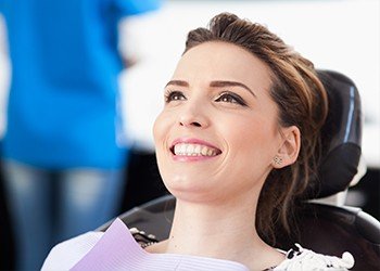 Smiling woman in dental chair