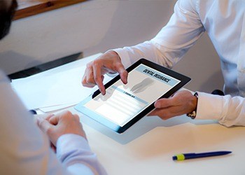 Dental insurance forms on tablet computer