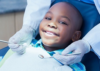 Smiling child in dental chair