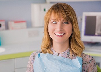 Smiling woman in dental chair