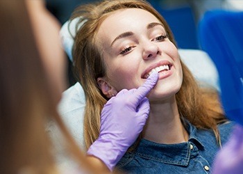 Smiling woman in dental chair