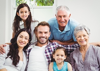 Three generations of family smiling together